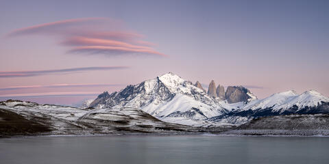 The sun rises in the early am at laguna amarga in Torres del Paine national  park in Chile in the winter.