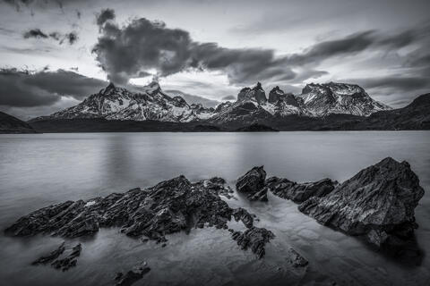 Cerro Paine Grande and los cuernos de Paine, the horns, are shown in Torres del Paine National Park in Southern Patagonia, Chile. Lago pehoe is also seen. 